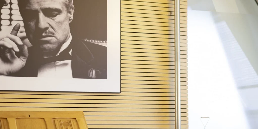 Godfather-Poster an einer Wand im ABACUS-Büro